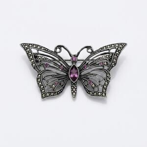 Vintage 1980s Silver tone butterfly brooch, LIA purple rhinestones marcasite